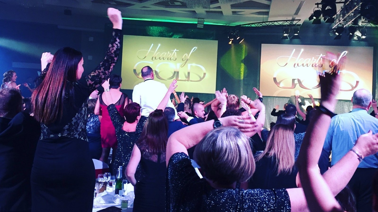 Guests celebrating at an annual awards evening